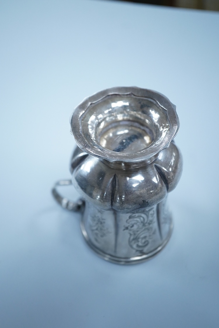 A Victorian engraved silver christening mug, on a pedestal foot, by Daniel & Charles Houle, London, 1848, 97mm, 4.4oz.